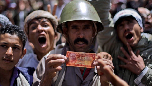 Yemen opposition supporters protest in Sanaa 
