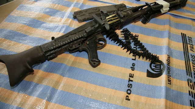 This handout photo provided by Vilnius Territorial Customs Office shows a German machine gun dating back from World War II, complete with ammunition that was found at the airport of Lithuanian capital Vilnius Tuesday, March 22, 2011. Lithuanian officials  