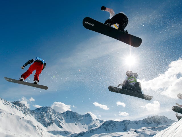 riders jump through the air 