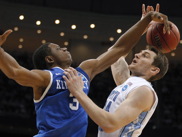 Kentucky's Terrence Jones knocks the ball away from North Carolina's Tyler Zeller  