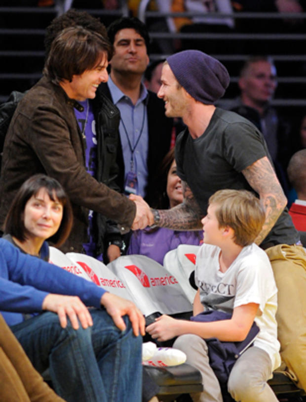 Tom Cruise greets David Beckham at an L.A. Lakers game. 