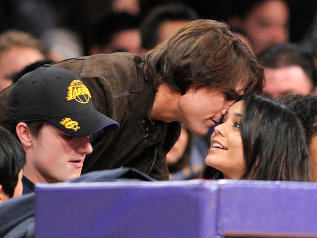 Tom Cruise greets Vanesse Hudgens at L.A. Lakers game 