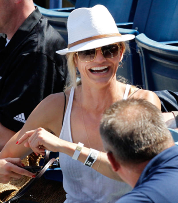 ctress Cameron Diaz talks to a security guard during the New York Yankees spring training baseball game 