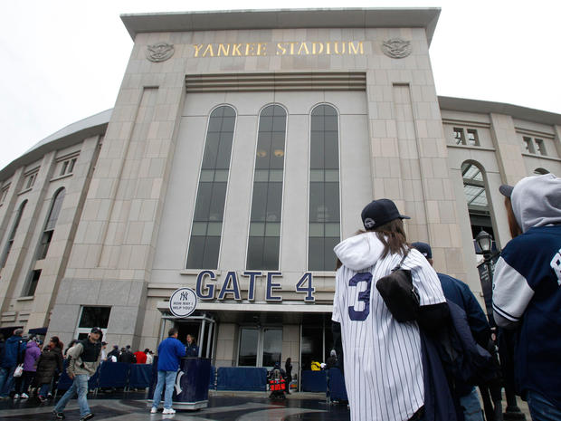 Fans line up at the main gate at Yankee Stadium  
