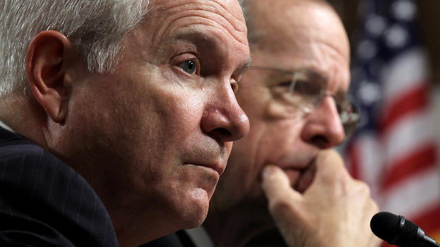 Robert Gates (L) and Adm. Mike Mullen testify on Capitol Hill 