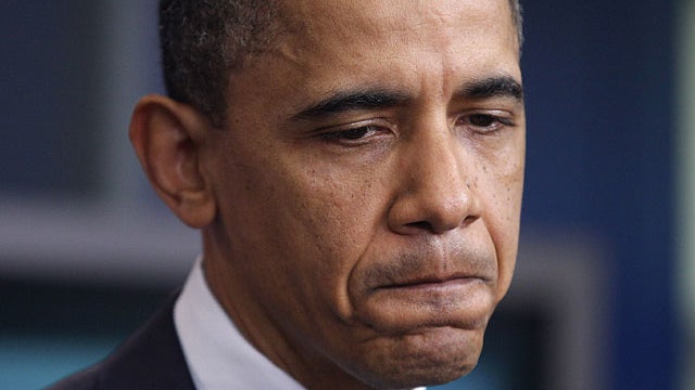 President Barack Obama pauses while speaking about the possible government shutdown, April 5, 2011, at the White House in Washington.  