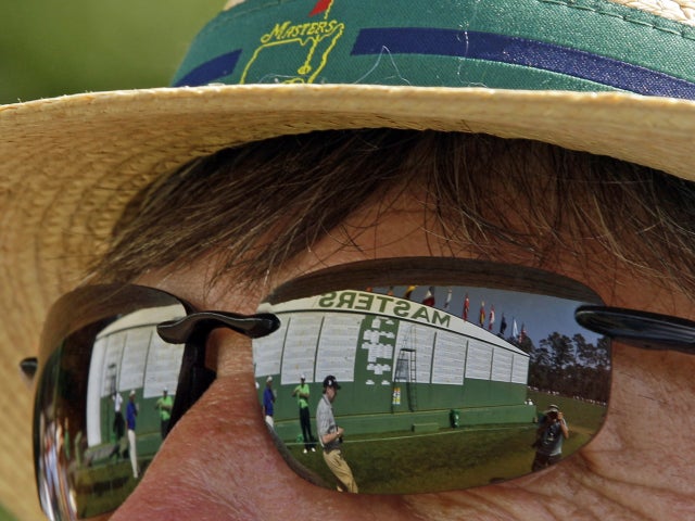 Rod Strader of Atlanta stands near the scoreboard  