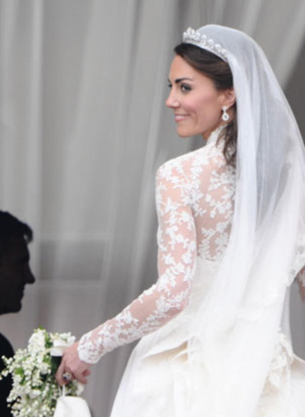 Kate, Duchess of Cambridge, turns back as she leaves the balcony of Buckingham Palace London 