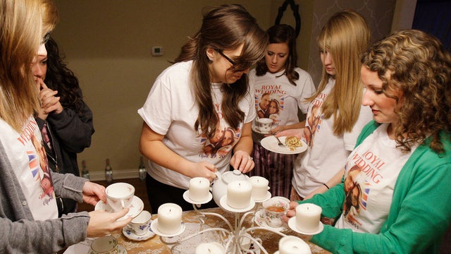 Jen Barnette, middle, pours English Tea during a private party in Indianapolis 