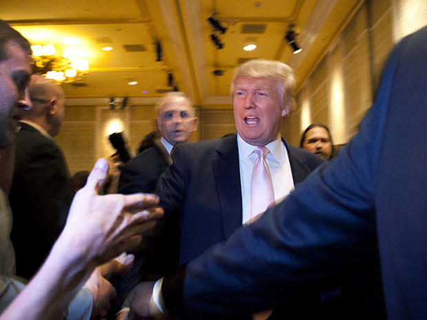 Donald Trump greets supporters before speaking to a crowd of 600 people during a gathering of Republican women's groups, Thursday, April 28, 2011, in Las Vegas. 