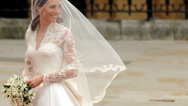 Prince William and his new bride Catherine Middleton walk down the aisle 