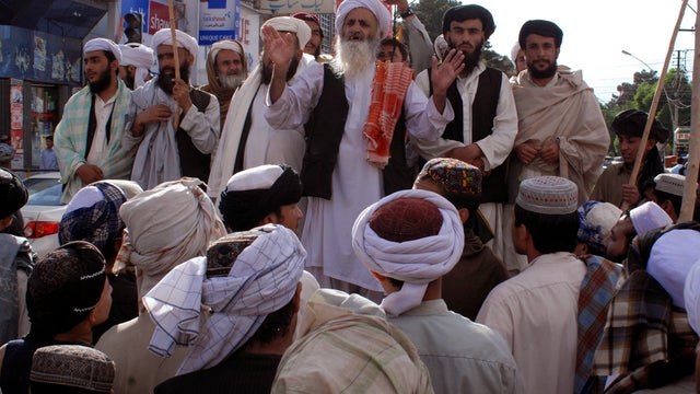 In this May 4, 2011 file photo, former Pakistani lawmaker and leader of a religious party Maulana Noor Mohammad addresses a rally to condemn the killing of al-Qaida leader Osama bin Laden in Quetta, Pakistan.  