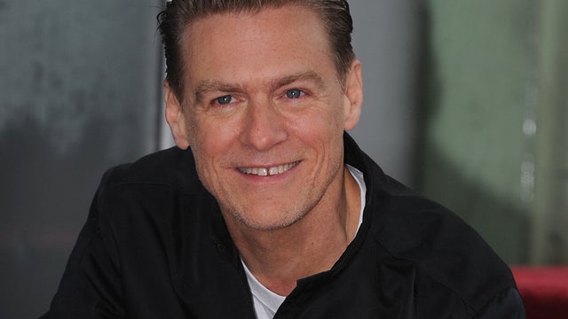 Canadian singer Bryan Adams poses after he is honored with a star on the Hollywood Walk of Fame on March 21, 2011, in Los Angeles. 