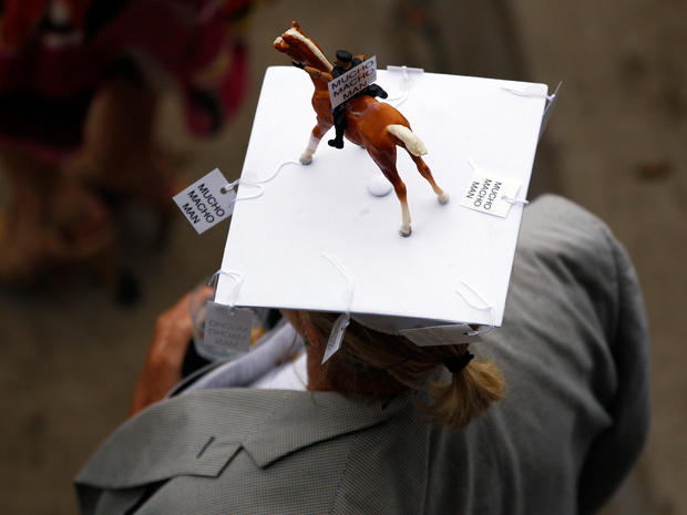 A spectator wears a homemade Derby hat before the 137th Kentucky Derby horse race at Churchill Downs, Saturday, May 7, 2011, in Louisville, Ky. 
