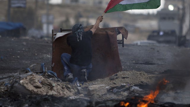 Palestinian protester during a clash with Israeli troops 