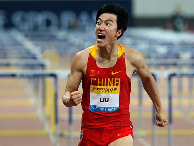 China's Liu Xiang reacts as he won the Men's 110 meter hurdles  
