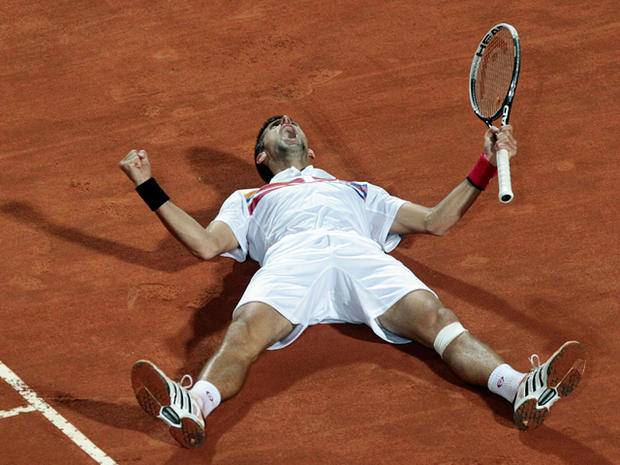 Serbia's Novak Djokovic celebrates at the end of the final match 