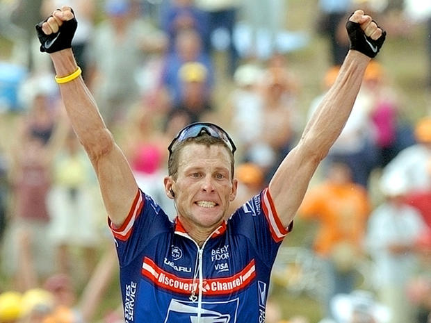 Lance Armstrong reacts after winning 