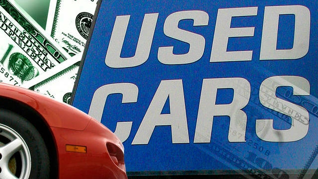 USED CARS sign on dealer lot 