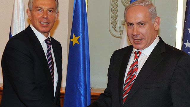 In this handout photo provided by the Israeli Government Press Office (GPO), Israeli PM Benyamin Netanyahu shakes hands with Middle East Quartet Envoy Tony Blair on May 3, 2011 in Jerusalem.  