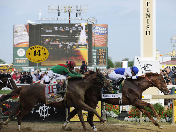 Shackleford, right, with Jesus Castanon aboard, crosses the finish line to win the 36th Preakness Stakes  