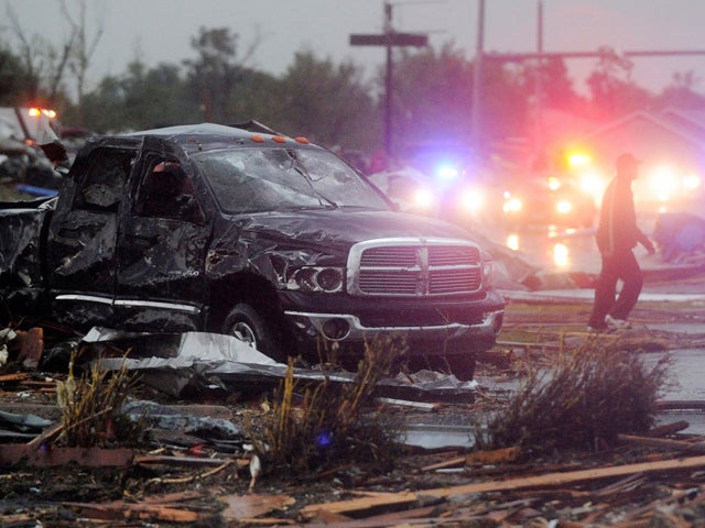 Emergency vehicles line up along northbound Rangeline Road 
