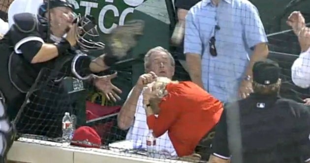 George W. Bush dodges ball, catcher at Rangers game - CBS News