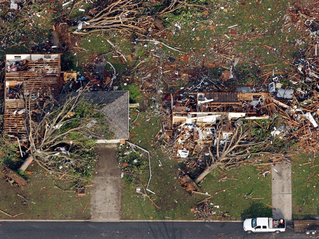 The path of a powerful tornado is seen in Joplin, Mo. Tuesday, May 24, 2011. 