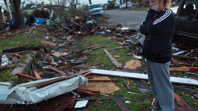 Carra Reed looks at a friend's home 