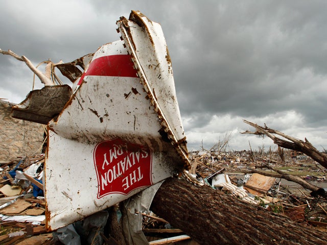 Salvation Army trailer is wrapped around a tree 
