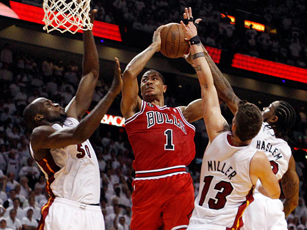 Miami Heat's Mike Miller Udonis Haslem and Joel Anthony surrround Chicago Bulls' Derrick Rose 