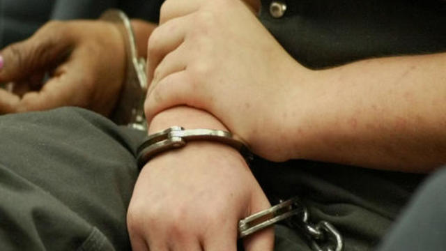 handcuffs_woman_arrest_charged.jpg 