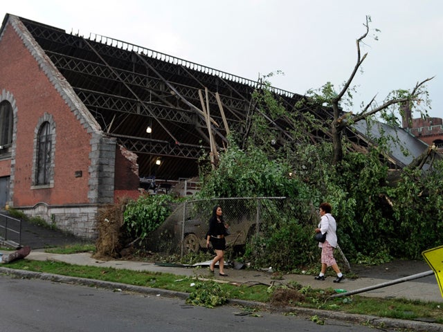  roof is damaged on a building after a tornado 