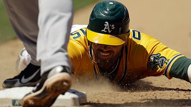 David DeJesus is caught off first base 