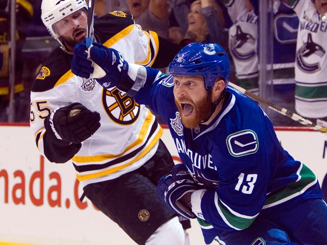 Raffi Torres celebrates after scoring the winning goal  