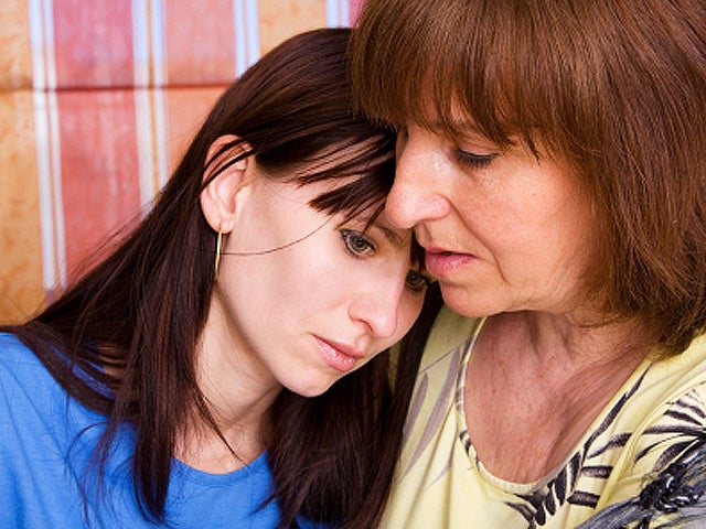 sadddaughterwithmom_iStock.jpg 