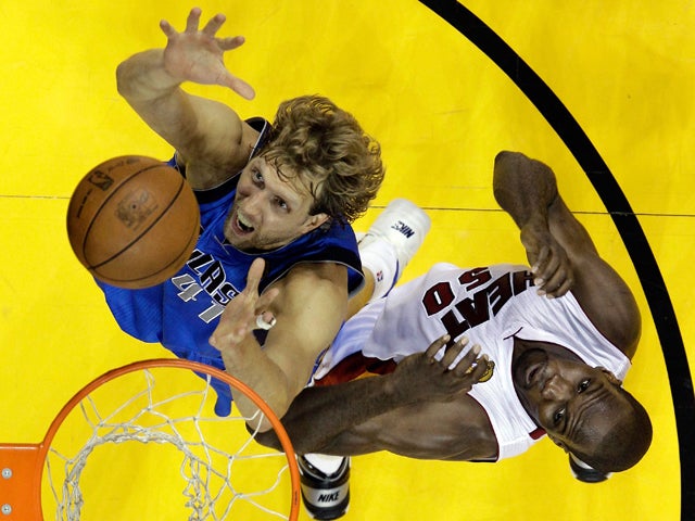 Dirk Nowitzki goes up for a rebound  