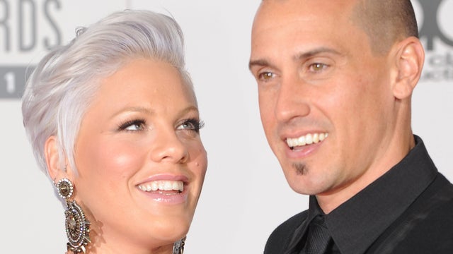 Singer Pink and husband Carey Hart arrive on the red carpet for the 2010 American Music Awards on Nov. 21, 2010.  