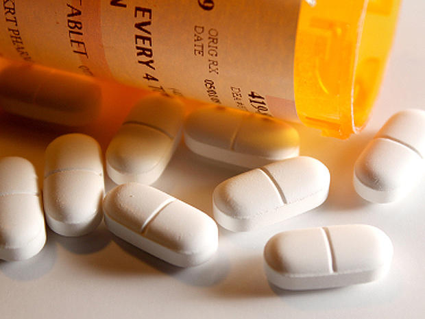 painkiller, vicodin, opioid, prescription pill bottles 