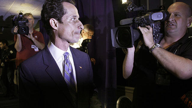 U.S. Congressman Anthony Weiner, D-NY, is pursued by the media as he leaves a news conference in New York, June 6, 2011.  