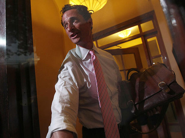 Rep. Anthony Weiner, D-N.Y., closes the front door of his building on reporters as he arrives at his house in the Queens borough of New York, Thursday, June 9, 2011. 