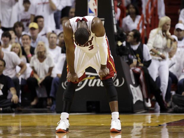 Dwyane Wade holds his head down 
