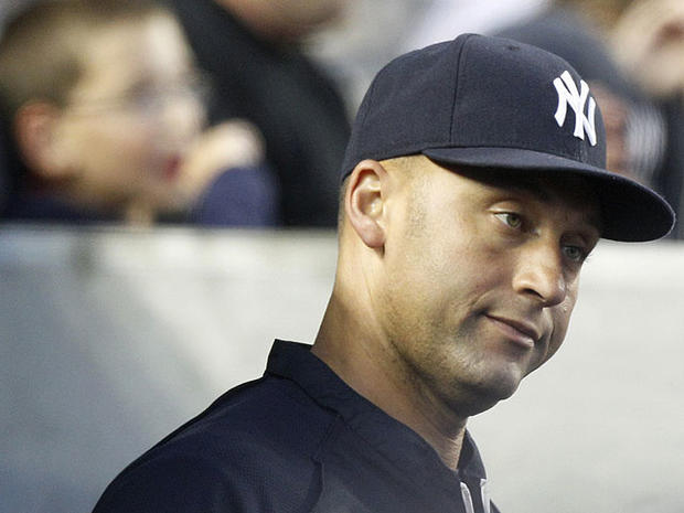 New York Yankees' Derek Jeter watches during the second inning of a baseball game against the Texas Rangers on June 14, 2011, at Yankee Stadium in New York. 