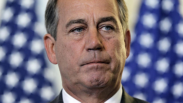 House Speaker John Boehner talks to the press following a political strategy session on Capitol Hill in Washington, June 14, 2011.  