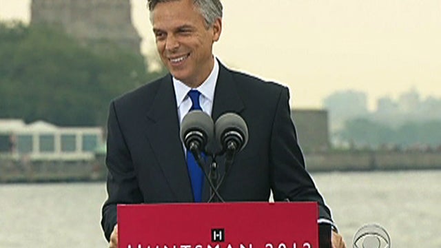 Former Utah Gov. Jon Huntsman announcing for president Tuesday. The base of the Statue of Liberty can be seen in the background 