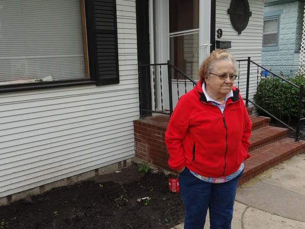 Tina Collom, 82, prepares to abandon her home in Minot, N.D. 