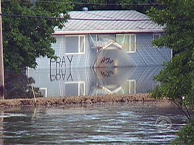 Record flood drowning Minot, N.D. 