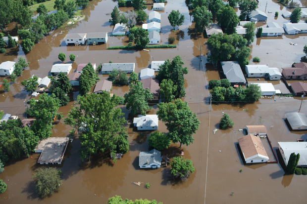 A neighborhood is submerged by flood water in Minot, N.D. 