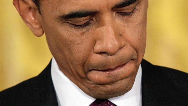 President Barack Obama pauses before answering a question during a news conference in the East Room of the White House in Washington, Wednesday, June 29, 2011. 