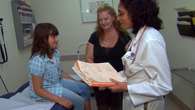 Sharon Brown and her 10-year-old daughter Rosa at the Arroyo Vista Family Health Center, a non-profit, community clinic in Los Angeles.   